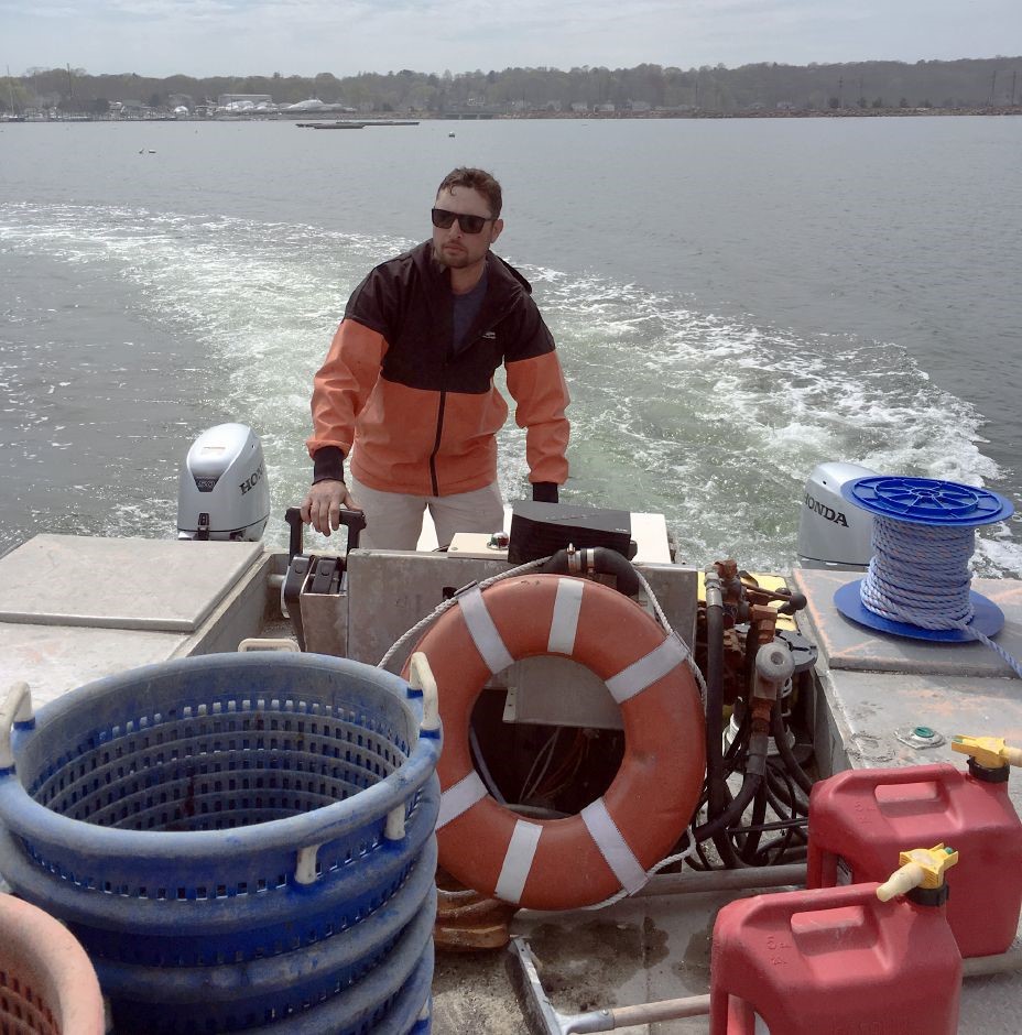 USCg PO 1C Marc Harrell at the helm of Dominion 1